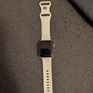 Smartwatch with Gold and White Band